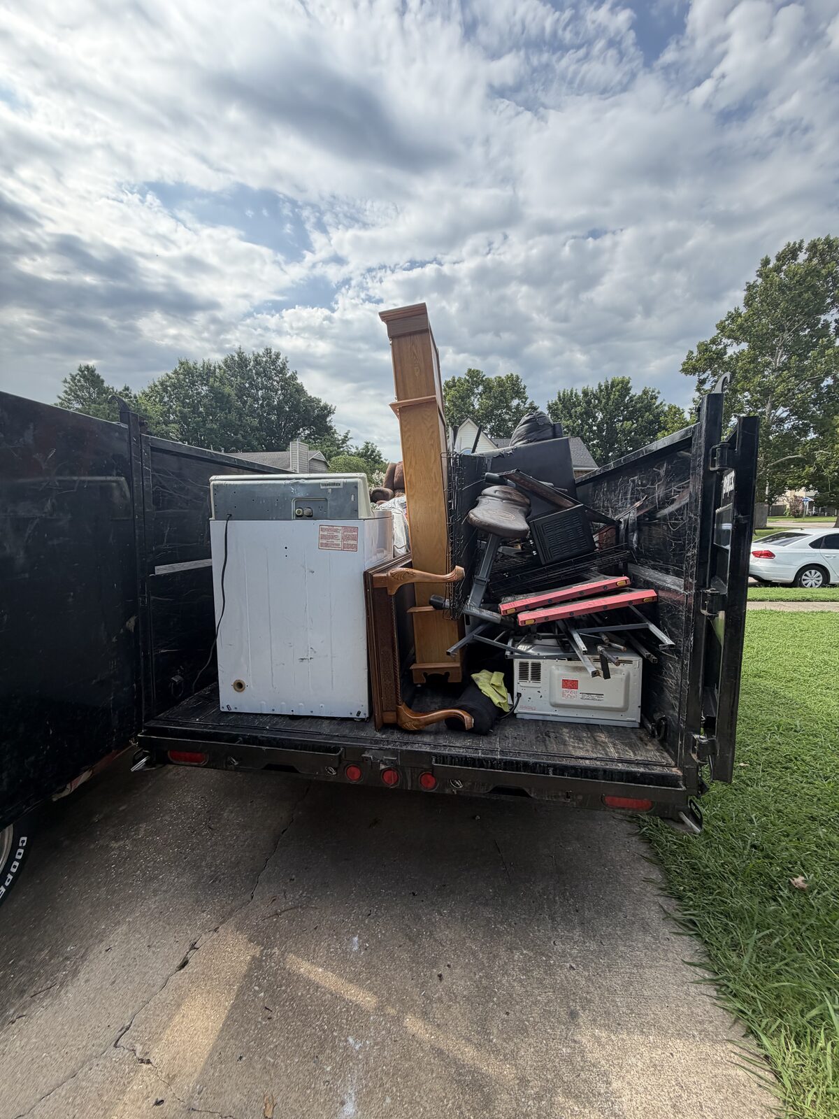Loaded trailer — appliances & furniture